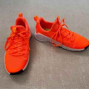 Nike Women’s Metcon Sneakers in Bright Orange